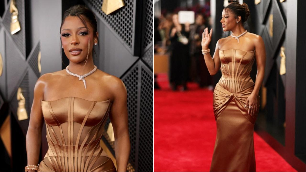 Singer-songwriter Victoria Monét was all about elegance as she made her red carpet appearance in a structured copper mermaid dress. 