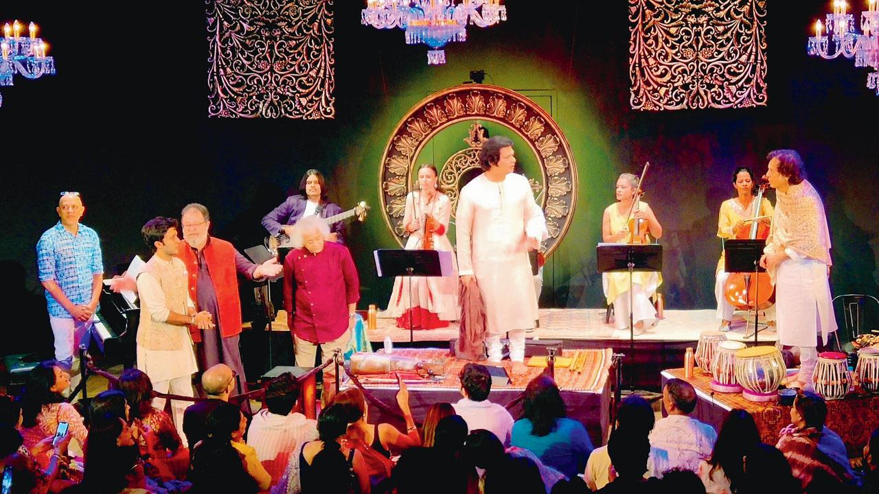 (From left) Zubin Balaporia, Zahan Kapoor, Kunal Kapoor, Karl Peters (seated behind), Taufiq Qureshi, Rakesh Chaurasia and Zakir Hussain on stage during the performance