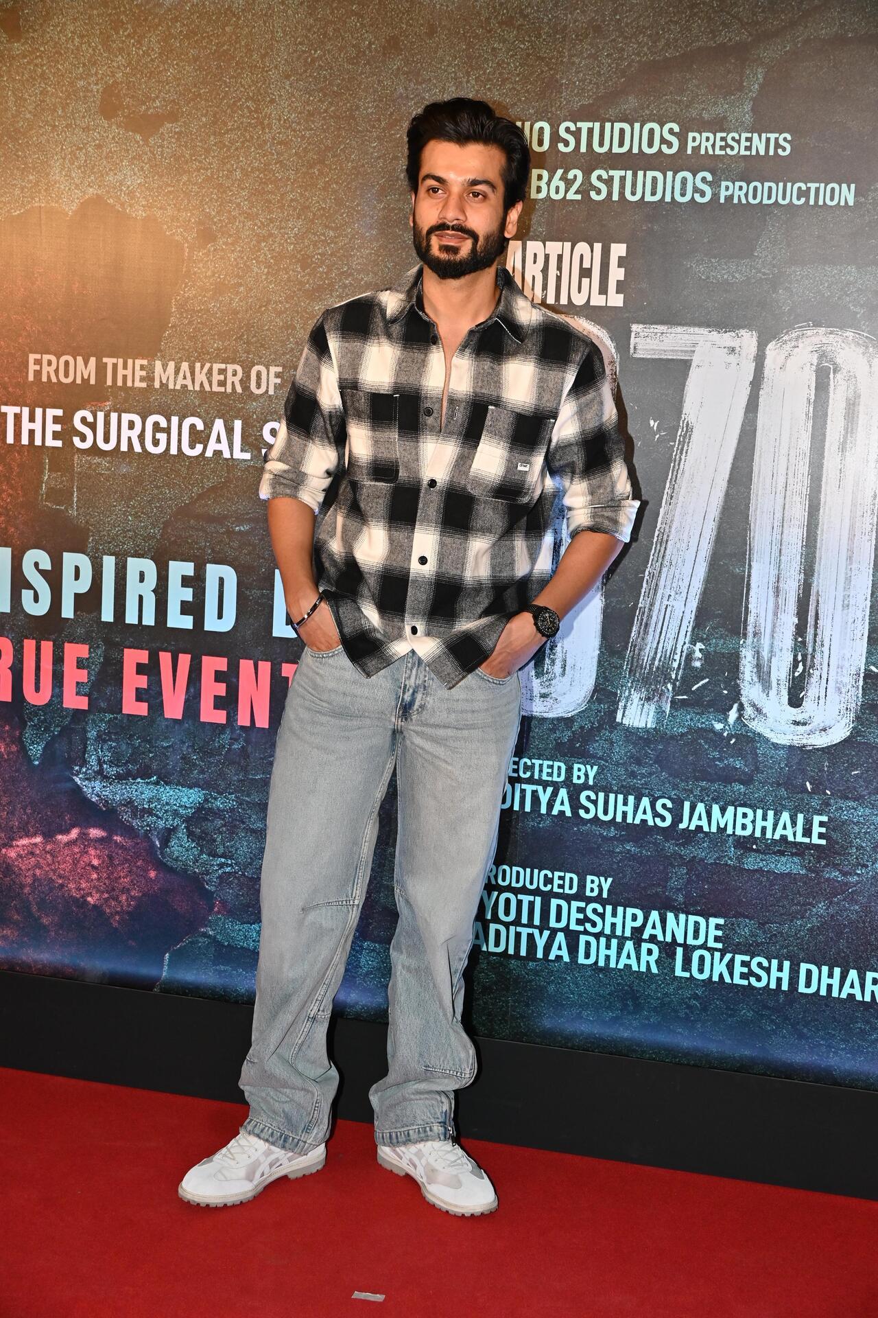 Sunny Kaushal looked smart in a casual striped shirt and denim pants for the screening