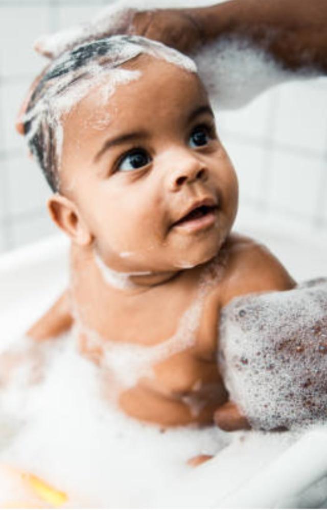 Ensure the water is comfortably warm, not too hot or cold, and use a mild, pH-neutral cleanser to gently cleanse their delicate skin
