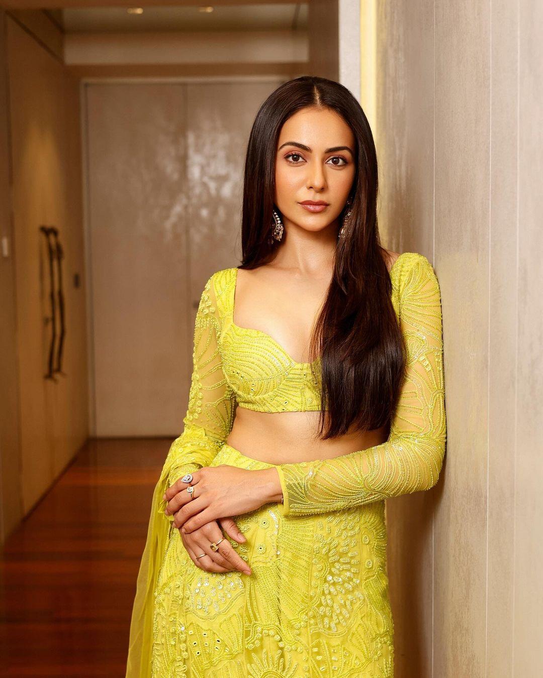 Rakul keeps her makeup simple and leaves her hair open. This look is a definite must-have for anyone aiming to make a statement this Basant Panchami