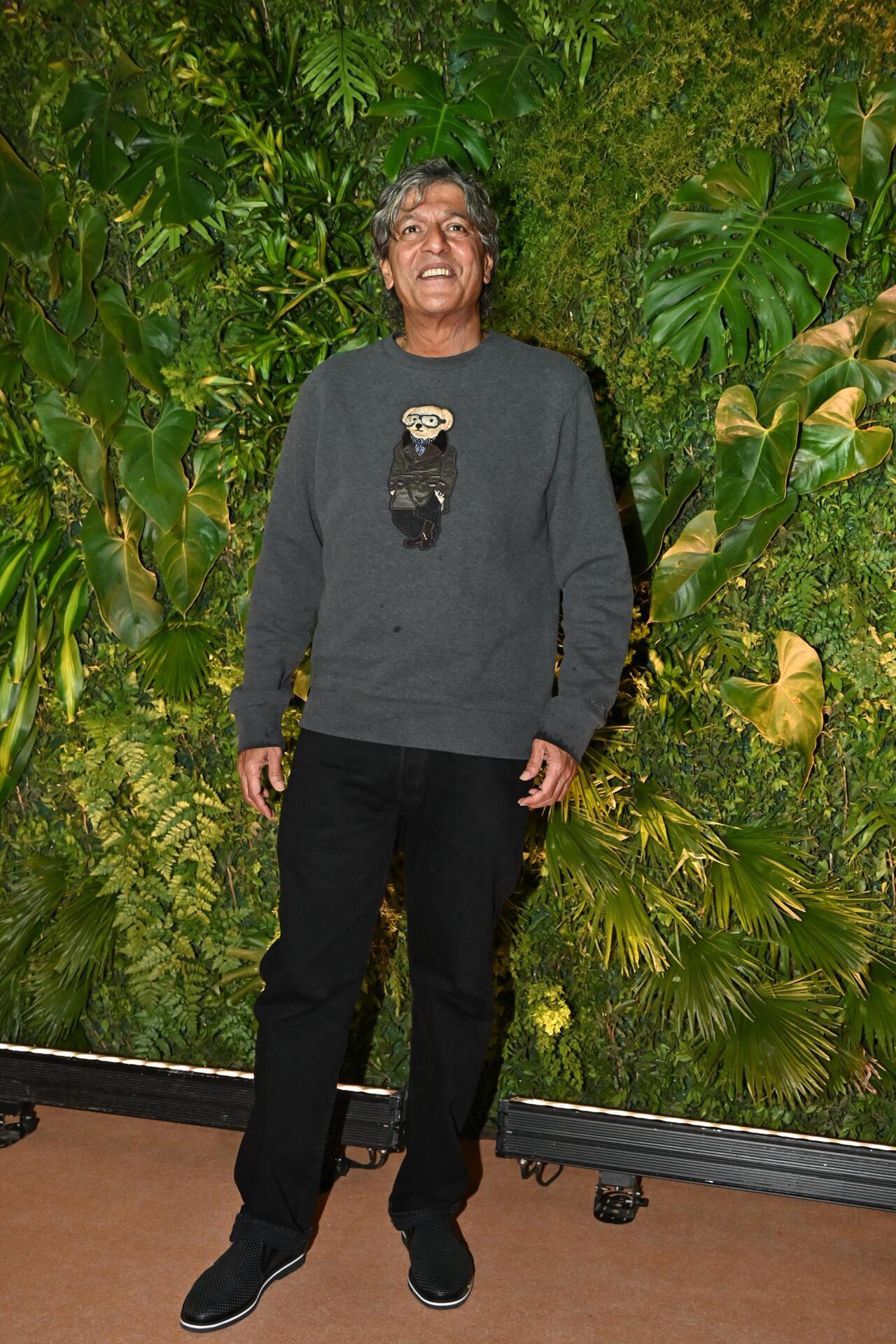 Chunky Pandey gives a heart smile as he poses for the paparazzi 