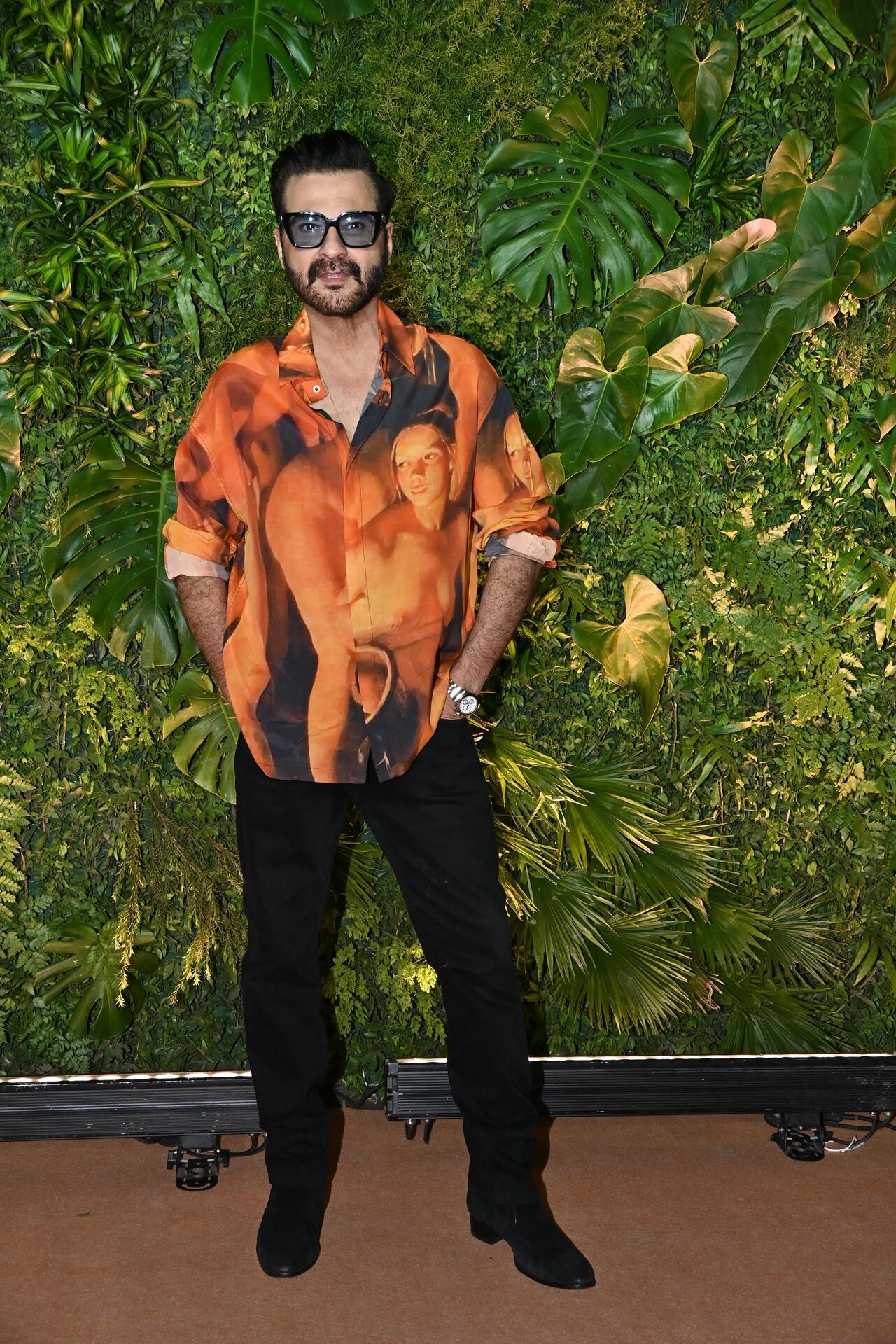 Sanjay Kapoor looks party-ready in this funky printed bright shirt