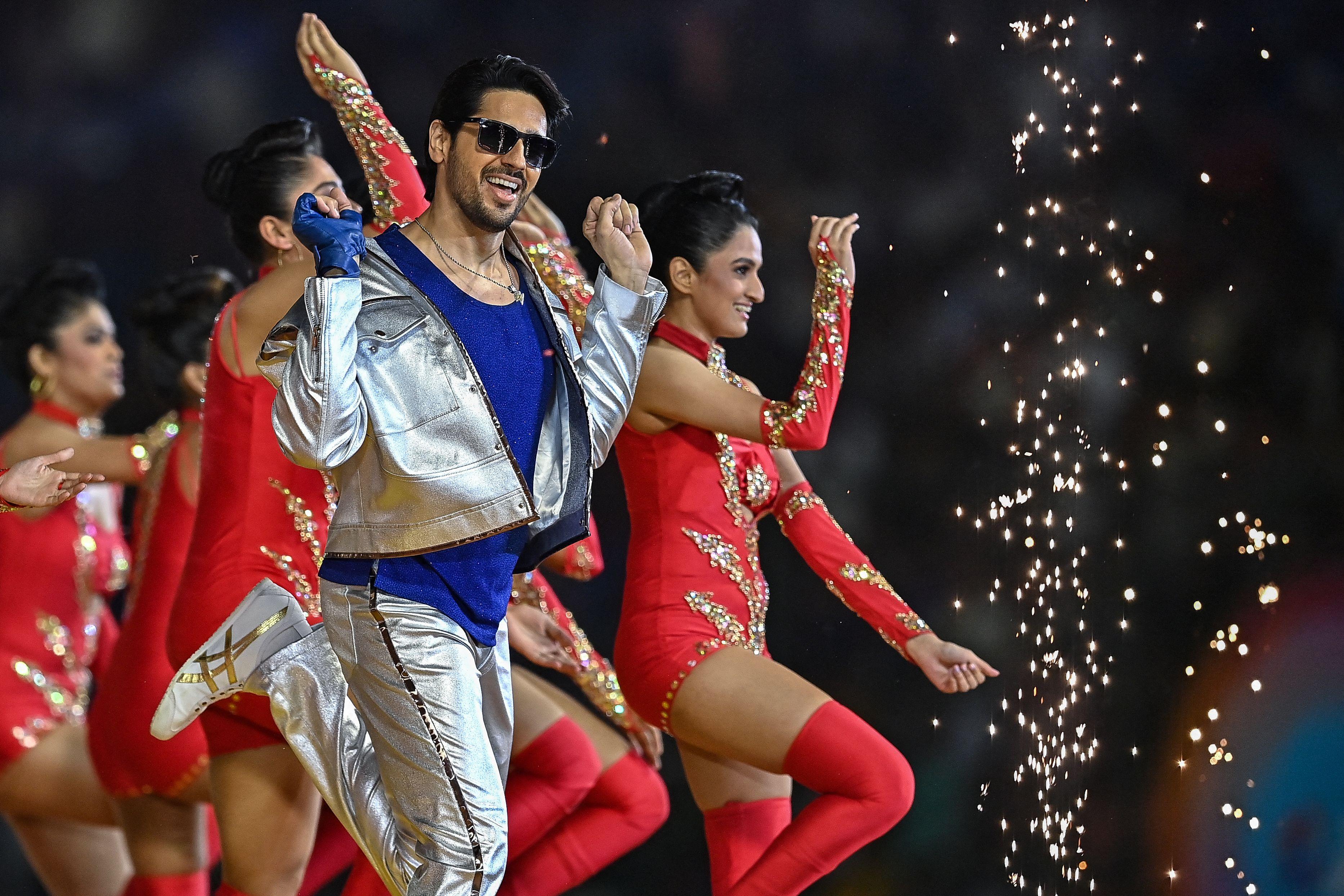 Sidharth Malhotra performed for the opening ceremony of 2024 Women's Premier League (WPL) before the start of the first 20-20 cricket match between Mumbai Indians and Delhi Capitals 