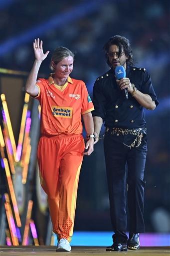 Gujarat Giants' captain Beth Mooney and Shah Rukh Khan take a stroll during the opening ceremony of Women's Premier League 2024 