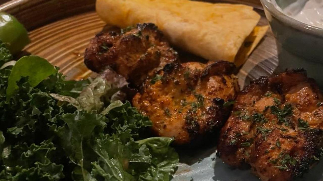 Next up on the menu is Chicken Shish: a tantalising dish served with lavash bread and a crisp salad. Elevate your culinary experience with a toothsome dip that perfectly complements the rich Turkish delights, creating a feast for the senses