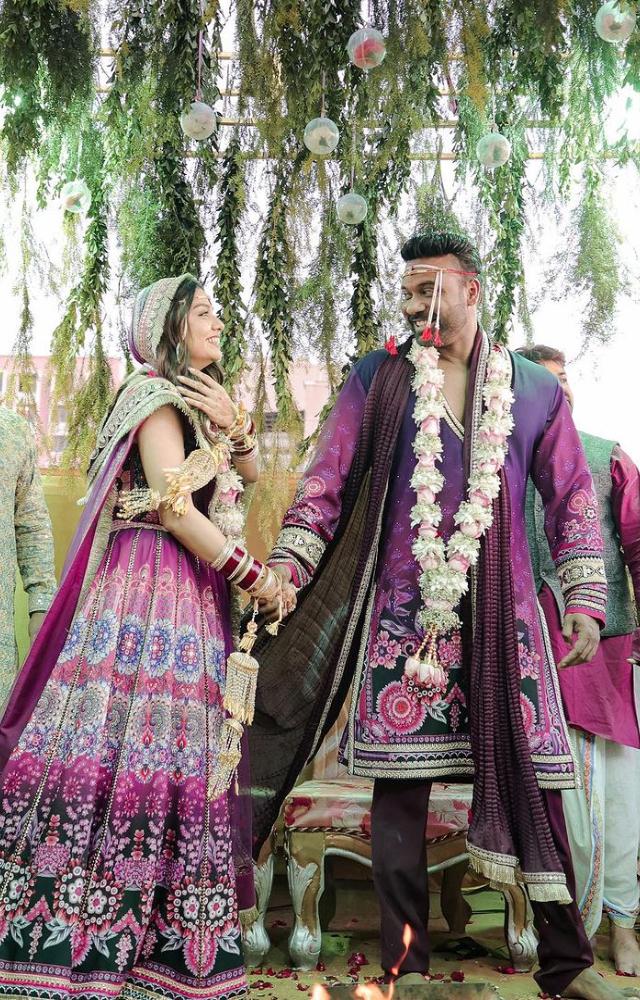 The Splitsvilla-fame actress tied the knot with her businessman boyfriend in a dreamy setup and opted for purple-coordinated outfits