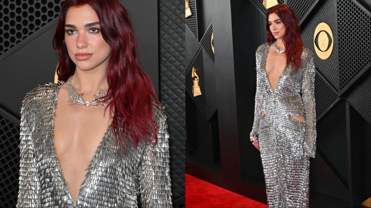 Dua Lipa dazzled on the red carpet in a chainmail-style custom-made gown with small cut-outs at the hip. 