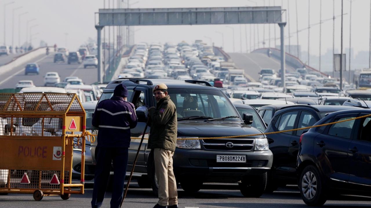 Long queues of vehicles choked the roads as several two-wheelers and four-wheelers were stuck in the jam at Sarita Vihar, officials said