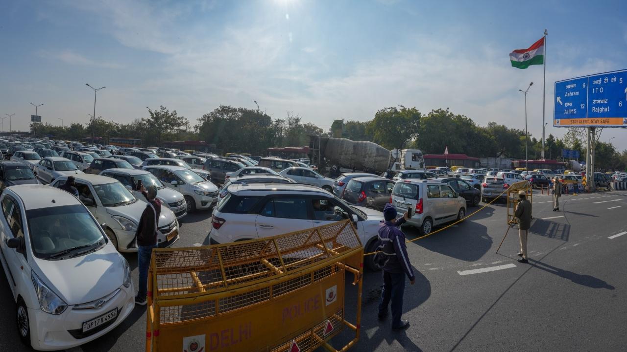 Motorists spent hours in the crawling traffic as the police personnel with heavy equipment were on alert to restrict movement on the road at the Delhi-Noida borders near Mayur Vihar, as the farmers tried to enter the national capital