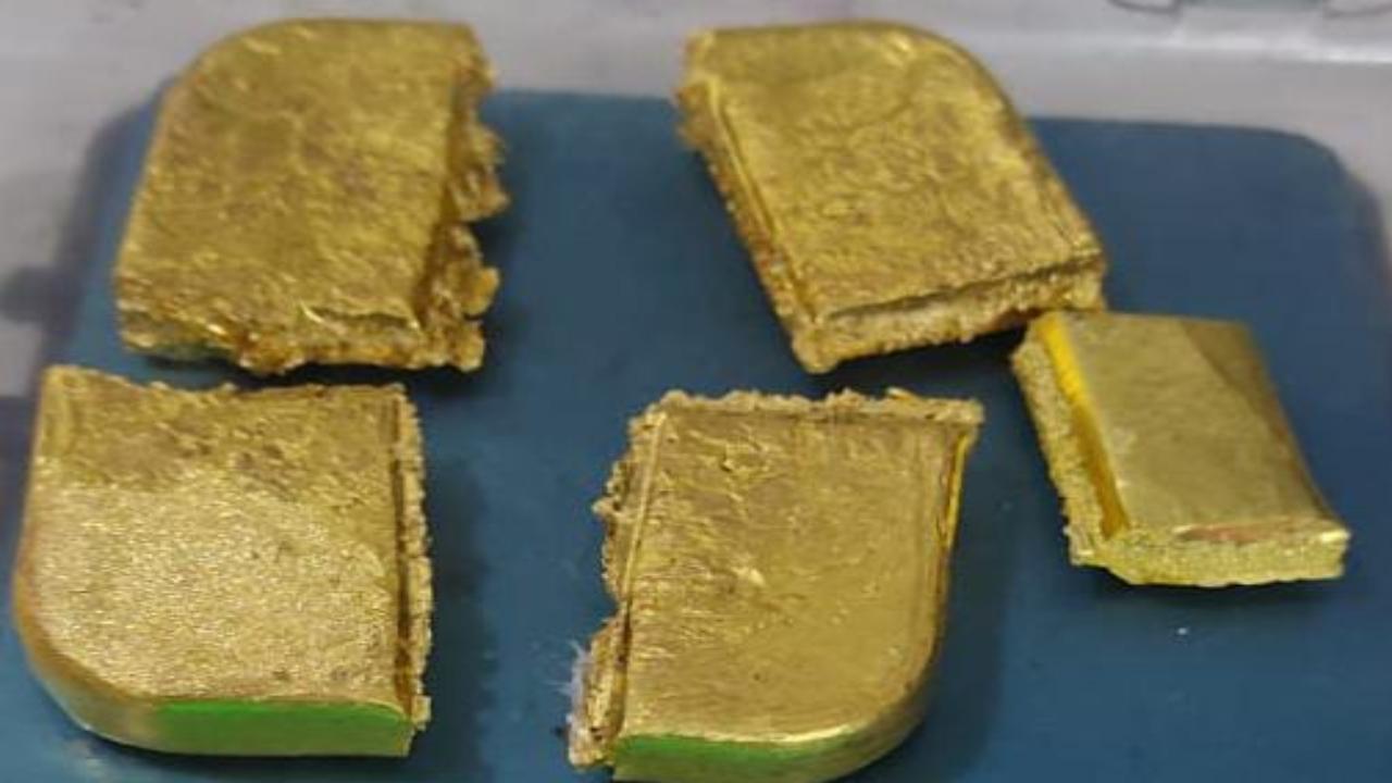 Mumbai Customs seizes over 8 kg gold and iPhones in multiple cases at airport