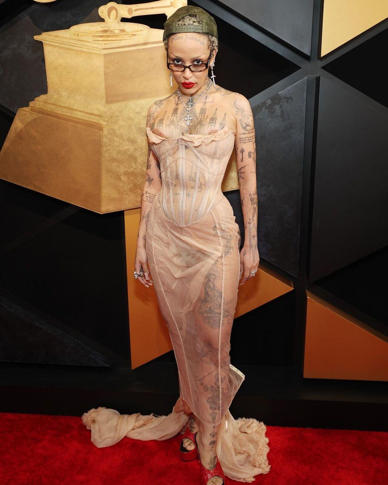 Doja Cat sure had heads turning in this Dilara Findikoglu dress. The see-through outfit well-complimented Doja's curvy body. The glasses only made the overall look distinct
