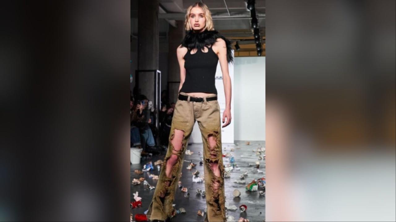 There are a few videos too that have taken social media by storm. The video shows models walking on the ramp while trash is being thrown at them. 