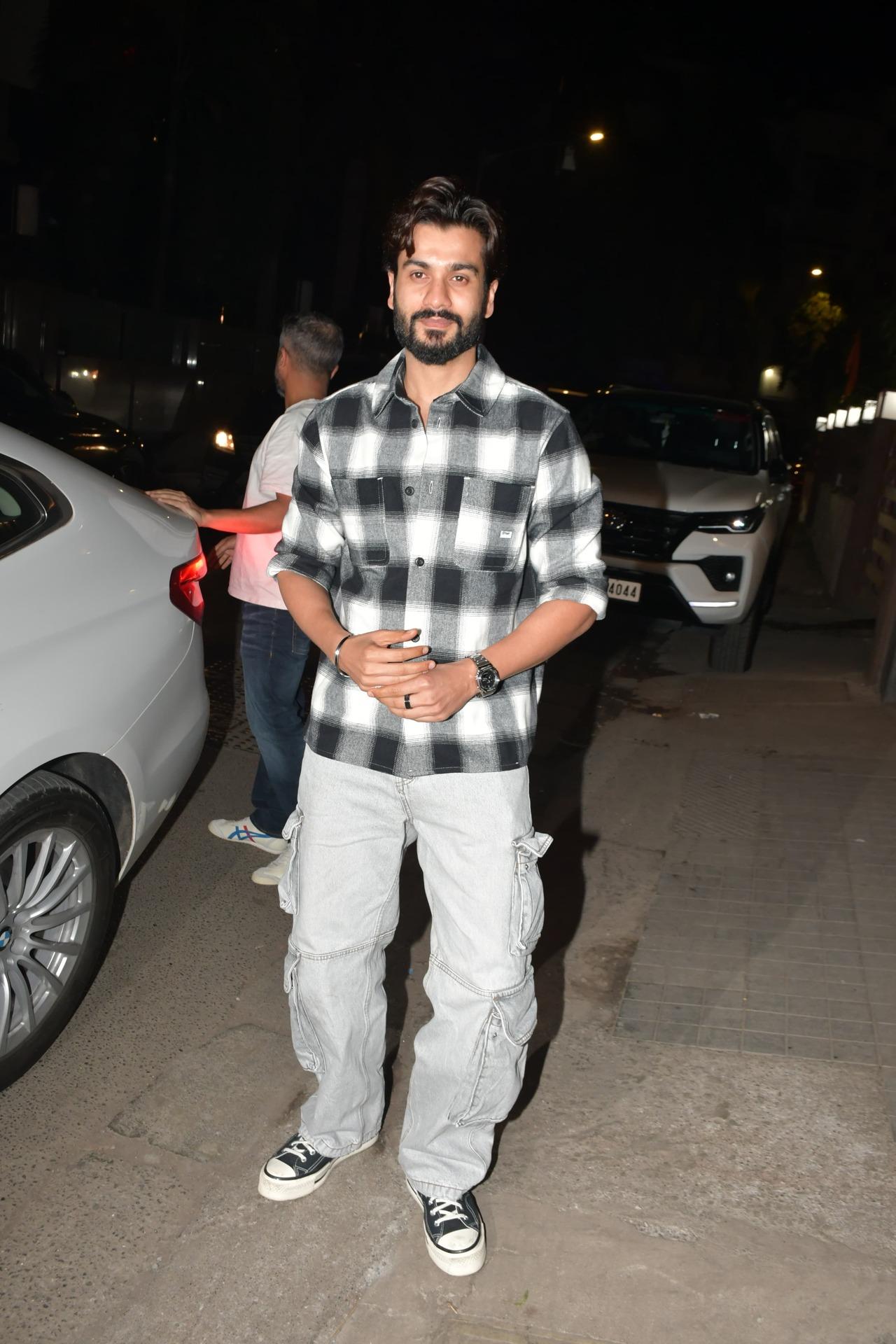 Actor Sunny Kaushal kept it casual in cargo pants and checkered shirt
