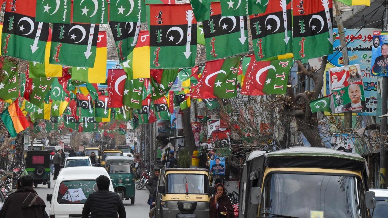 A street festooned with flags of political parties ahead of Pakistan's national elections, in Quetta