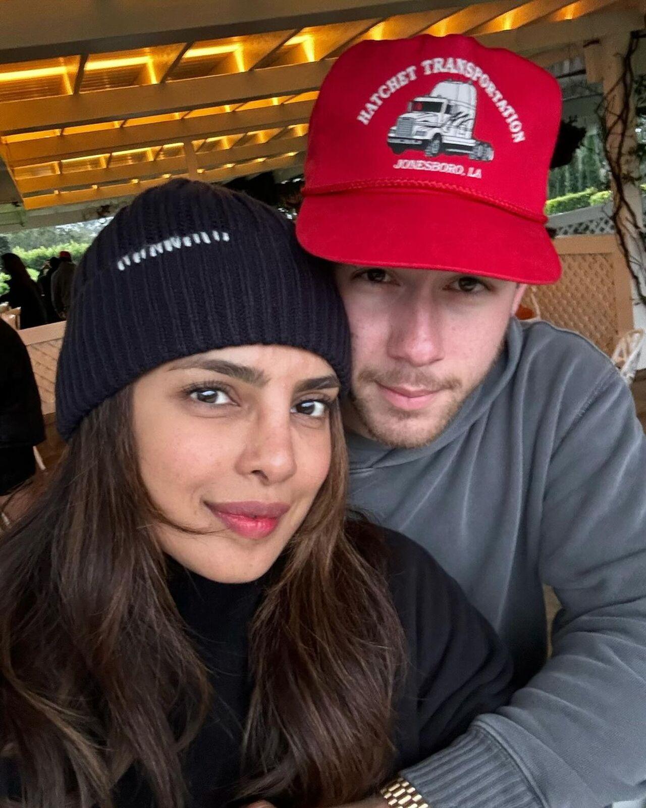 Priyanka and Nick make for a cute selfie as they pose dressed in athleisure wear and baseball caps