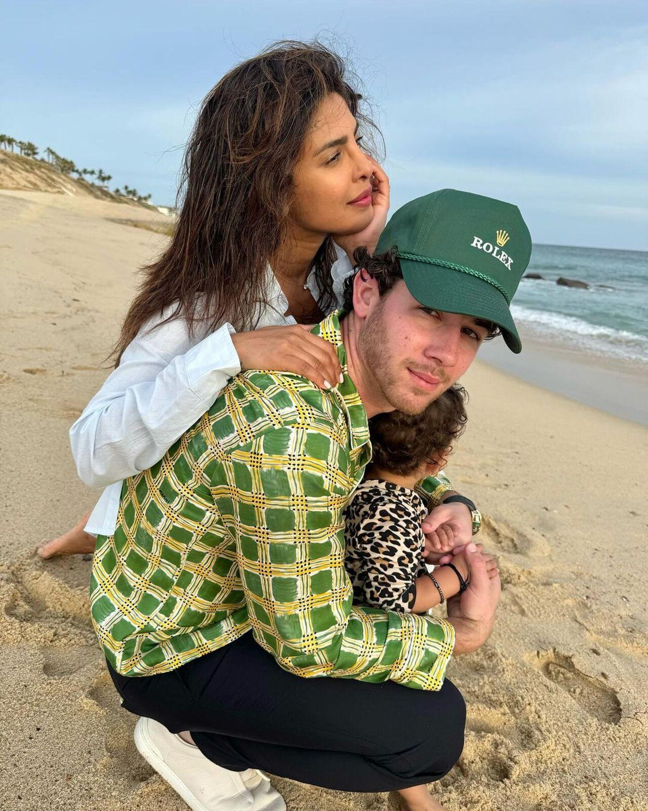Priyanka, Nick and Malti soak in the breeze at a beach in LA