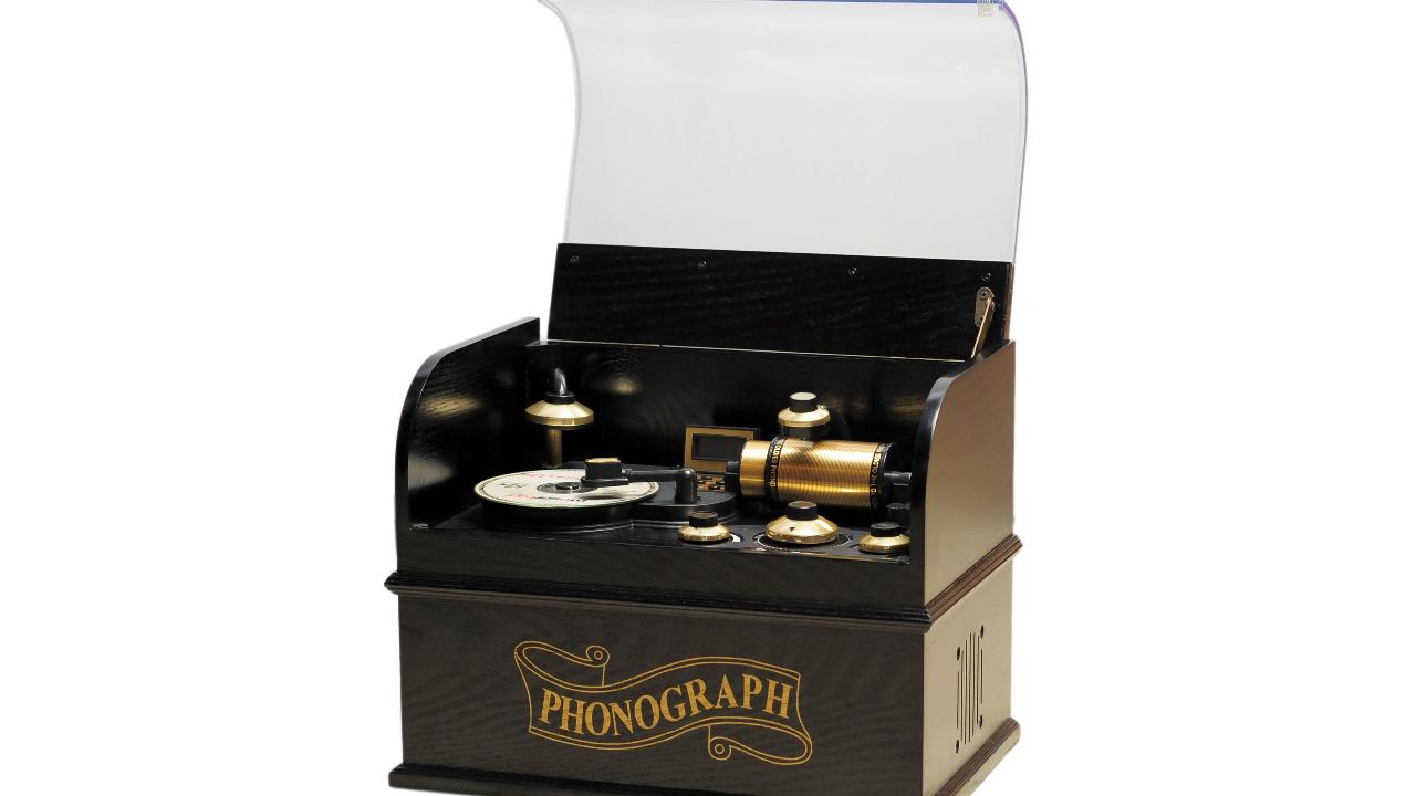The Phonograph CD Jukebox is a dream come true for music lovers who have limited space for a classic jukebox. It features premium quality speakers for crystal clear sound and modern features like Bluetooth connectivity and AM/FM radio