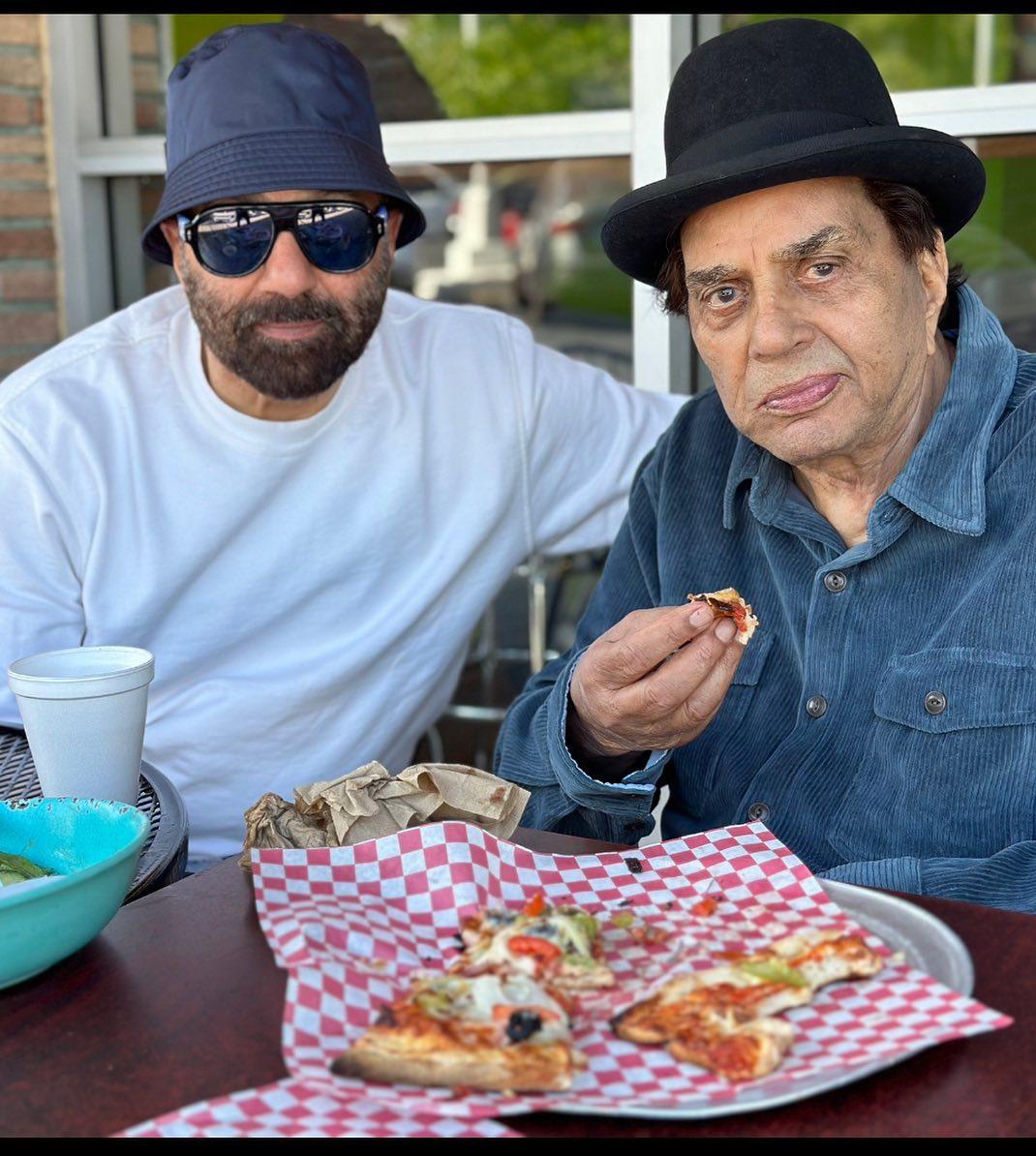 Recently, Sunny Deol posted a picture of himself and his father Dharmendra indulging in a slice of 'Za in a picturesque location