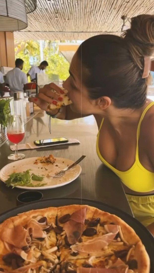 After Malaika Arora returned from her vacation in Maldives with Arjun Kapoor, she posted a video which featured their treasured moment. We could not help but notice one of her favourite moments included relishing a slice of pie