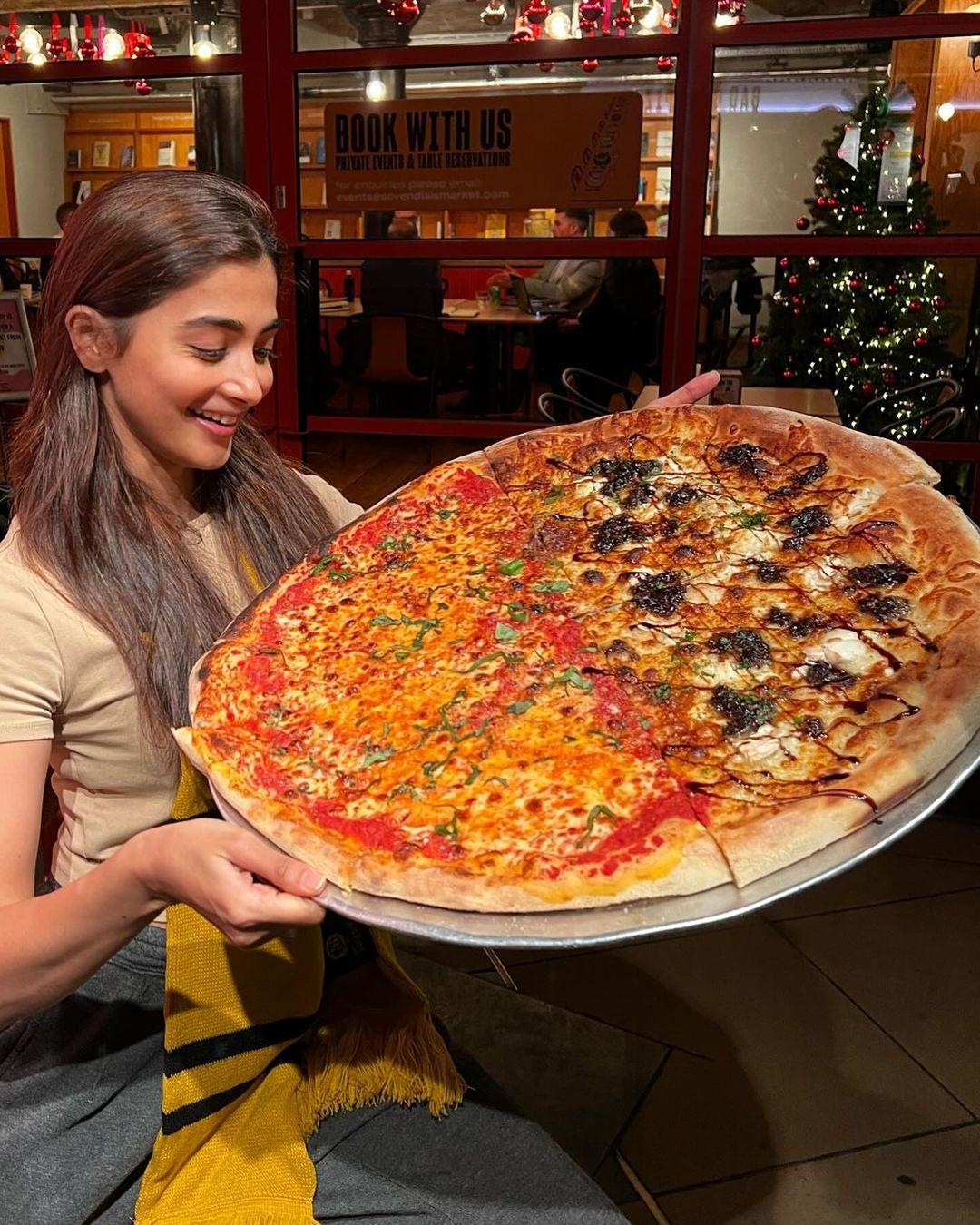 Pooja Hegde took Pizza Day to a whole other level! We feel just like Pooja looking at that whole pie!