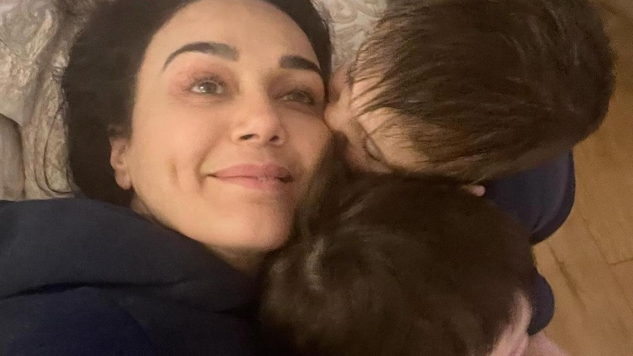 Preity Zinta enjoys with twins Gia and Jai, shares pic as they shower her with kisses