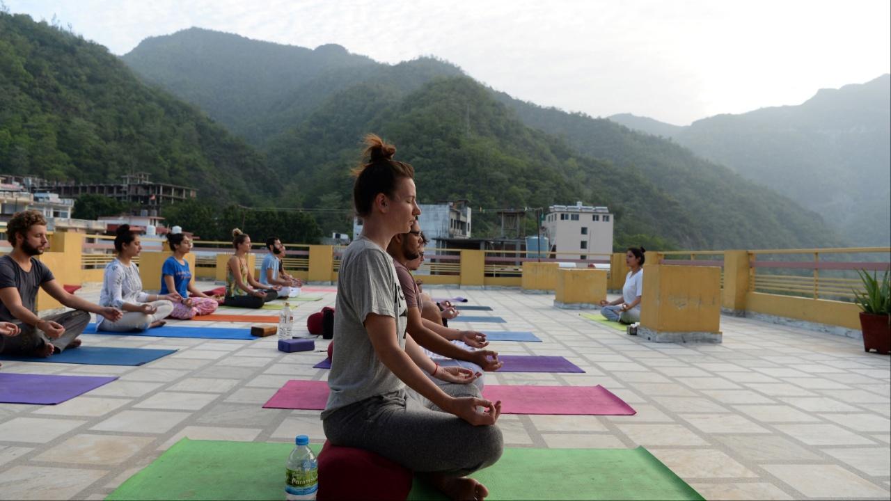 1. Rishikesh, Uttarakhand:Nestled in the Himalayan region and known as the ‘Yoga Capital of the World,’ Rishikesh offers a serene environment, ideal for meditation, yoga, and spiritual retreats. The presence of ashrams, the sacred Ganges River, and the tranquillity of the surrounding nature make it a perfect destination for spiritual rejuvenation. 