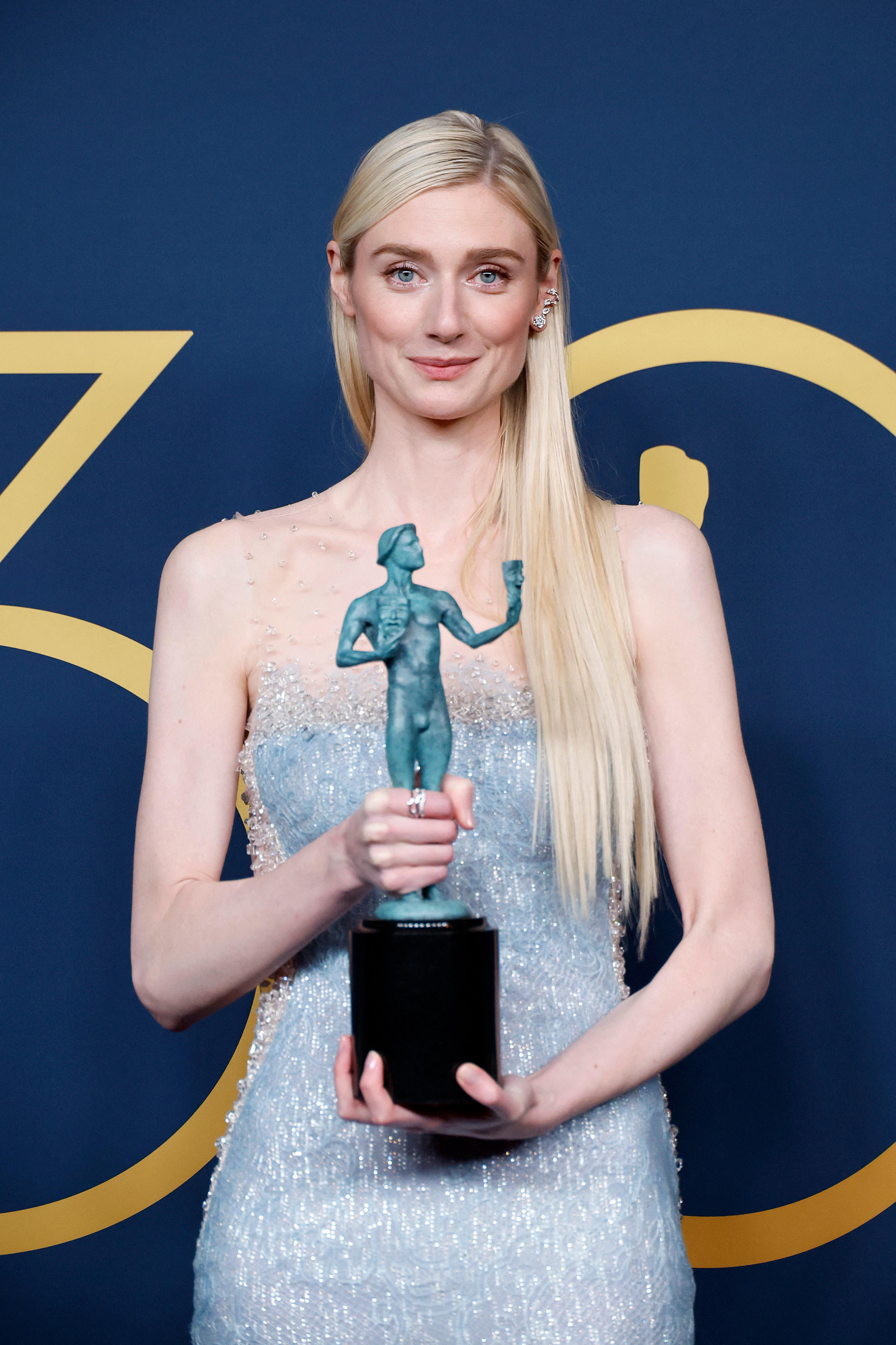 Elizabeth Debicki, won Outstanding Performance by a Female Actor in a Drama Series award for 'The Crown'. The actress posed in the press room during the 30th Annual Screen Actors Guild