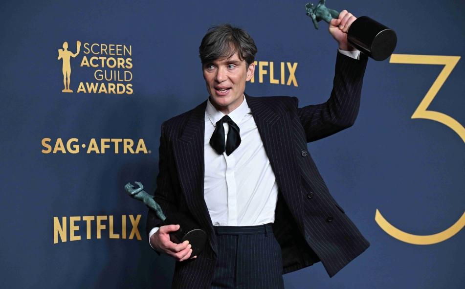 Irish actor, Cillian Murphy, poses with two awards in the press room. He won Outstanding Performance by a Male Actor in a Leading Role in a Motion Picture and Outstanding Performance by a Cast in a Motion Picture for 'Oppenheimer'