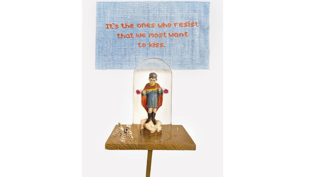 It’s the Ones Who Resist That We Most Want to Kiss by Saviojon Fernandes features a figurine of Catholic Saint Roch, the patron saint of dogs, sick and invalids, and a dog raffia figurine he picked up from a Belgium flea market. Pic Courtesy/Galleryske