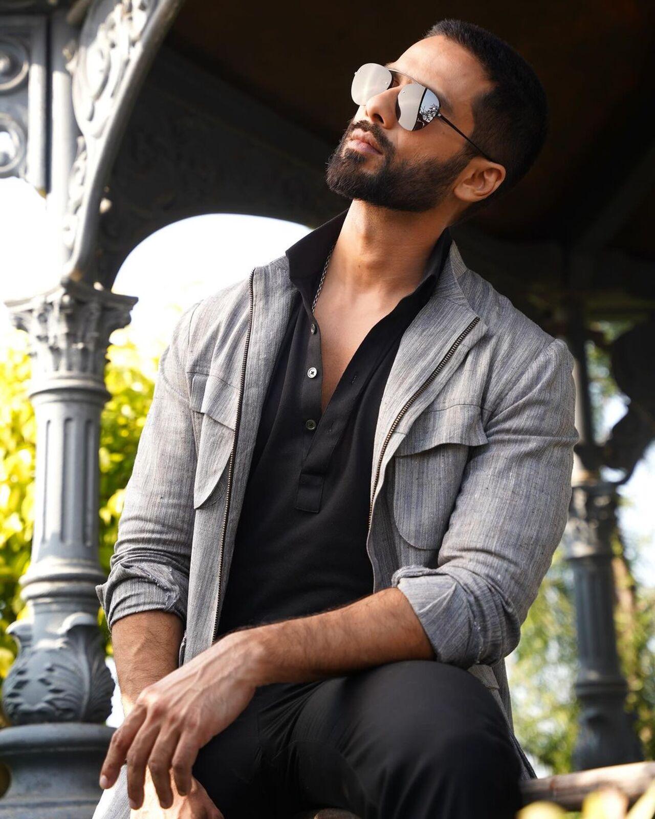 Shahid Kapoor opted for semi-formal look as he paired his black shirt and pants with a grey blazzer