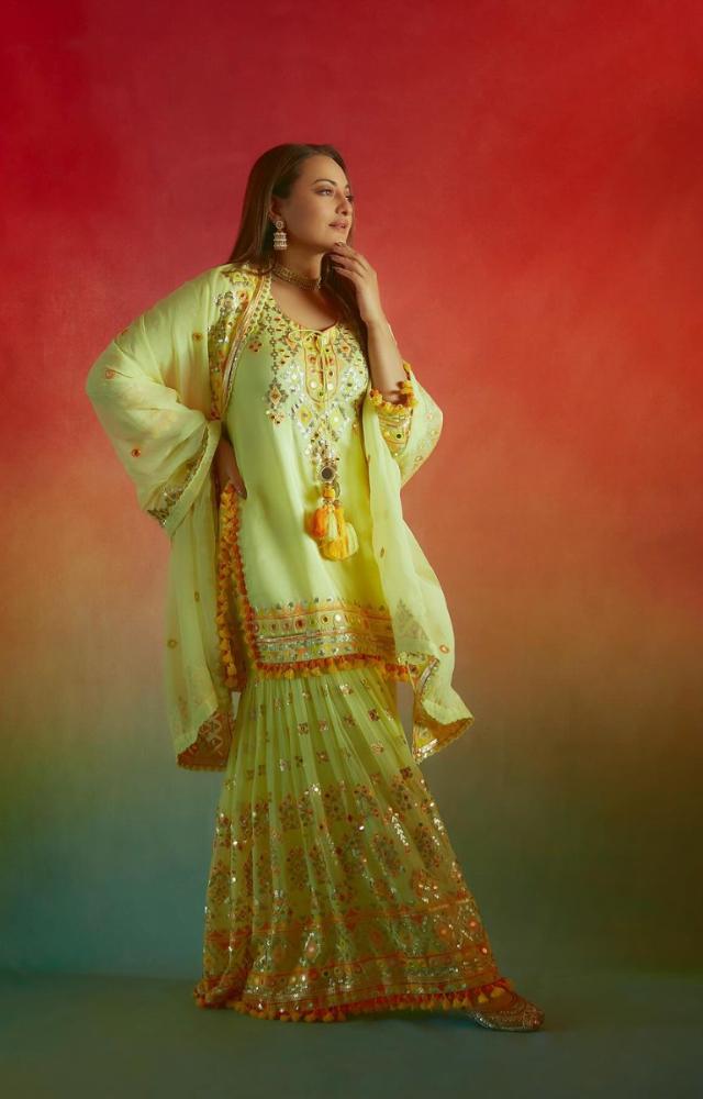 She made a splash wearing a lime green embroidered ethnic outfit