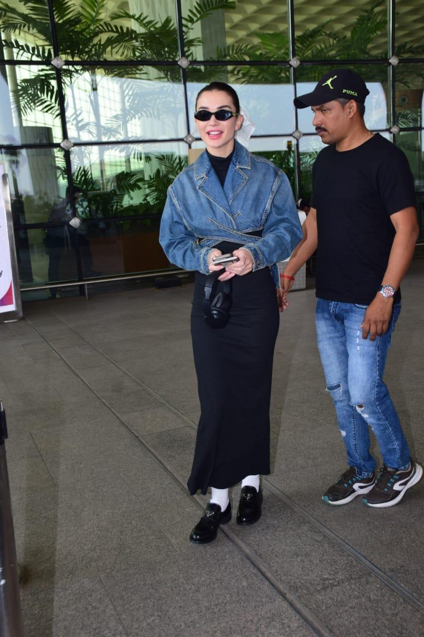 Amy Jackson looked glamorous at the airport, sporting chic sunglasses.