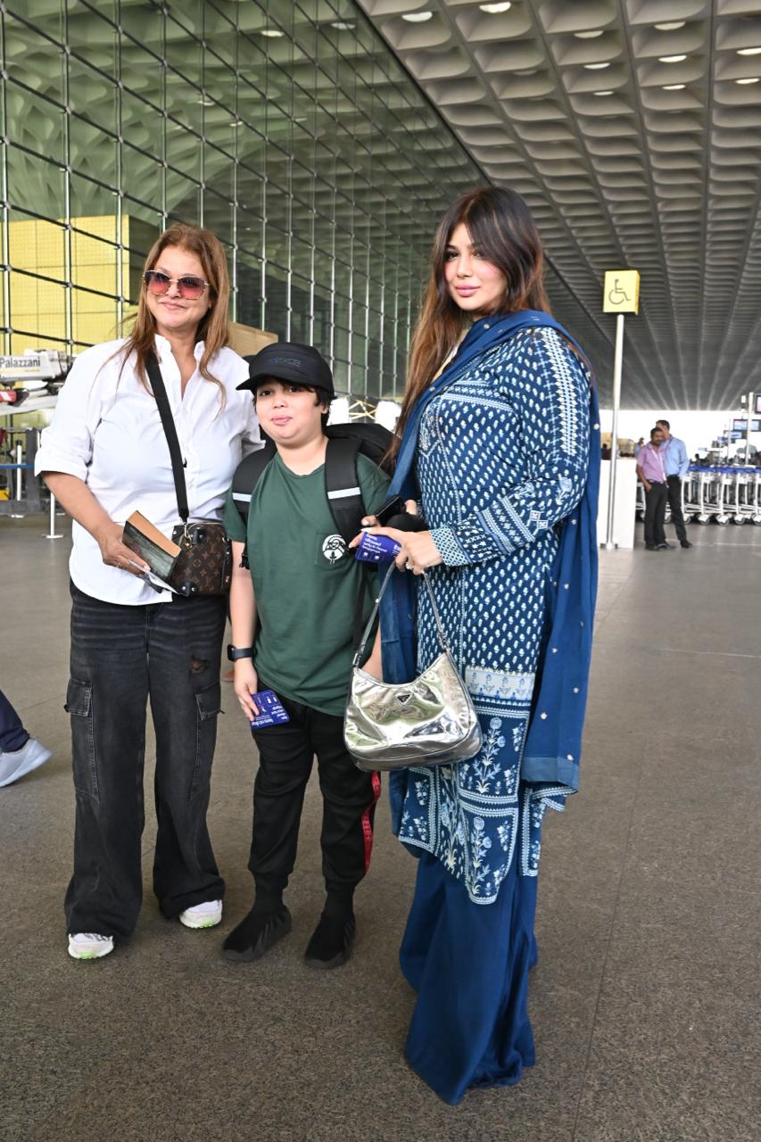 Ayesha Takia was spotted as she arrived at Mumbai airport for her flight out of the city She was seen dressed in a blue salwar kameez and was accompanied by her son.