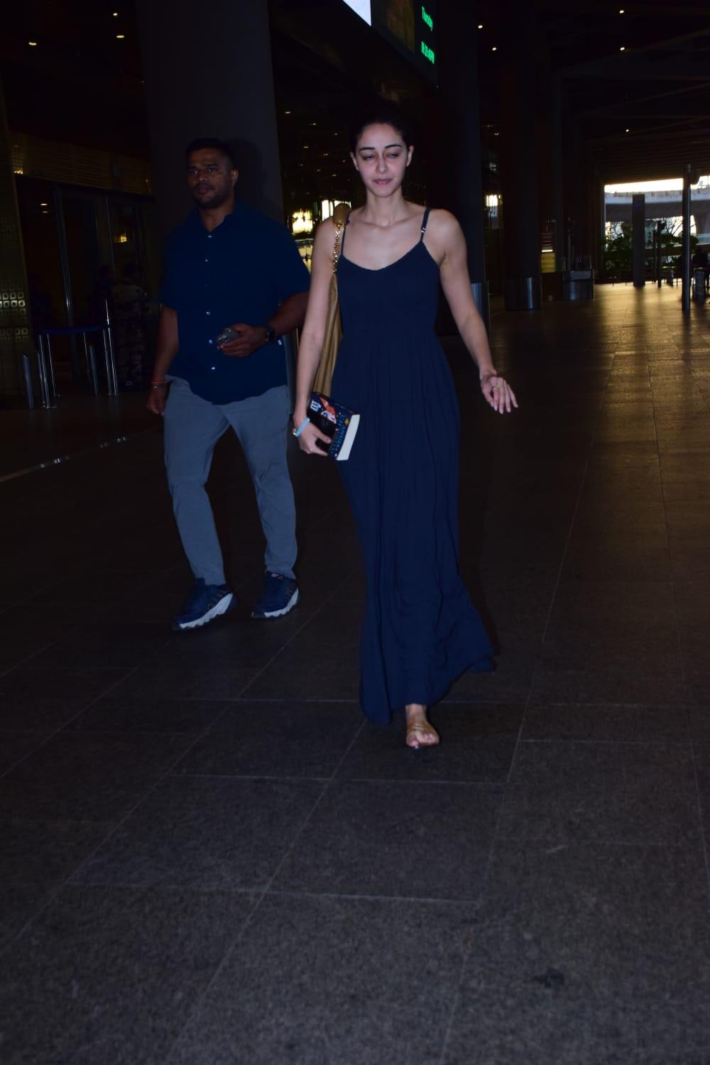 Ananya Panday was spotted at the Mumbai airport returning from Goa. She opted for comfy blue slip dress for her travels
