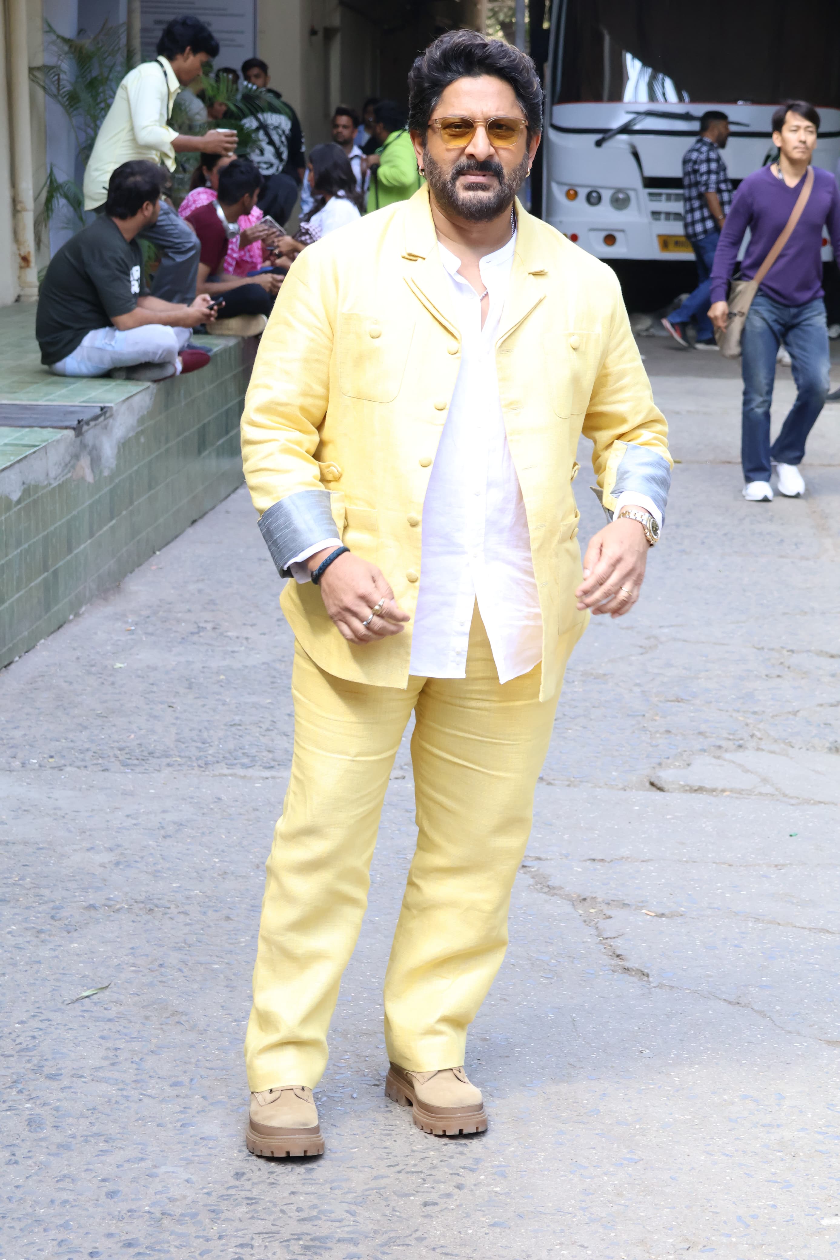 Arshad Warsi looked handsome in his yellow attire. The actor was all smiles for the paparazzi