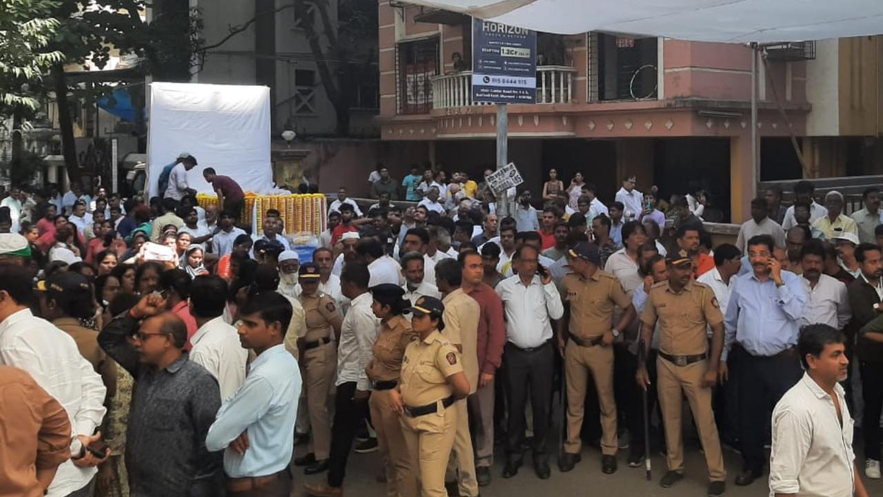 IN PHOTOS: Shiv Sena (UBT) workers gather outside Abhishek Ghosalkar's house
