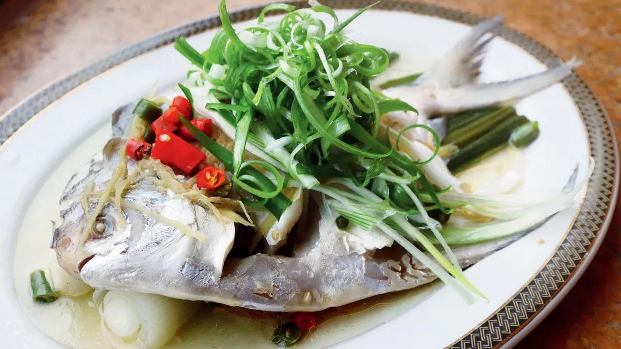 Steamed fish on the New Year menu represents abundance