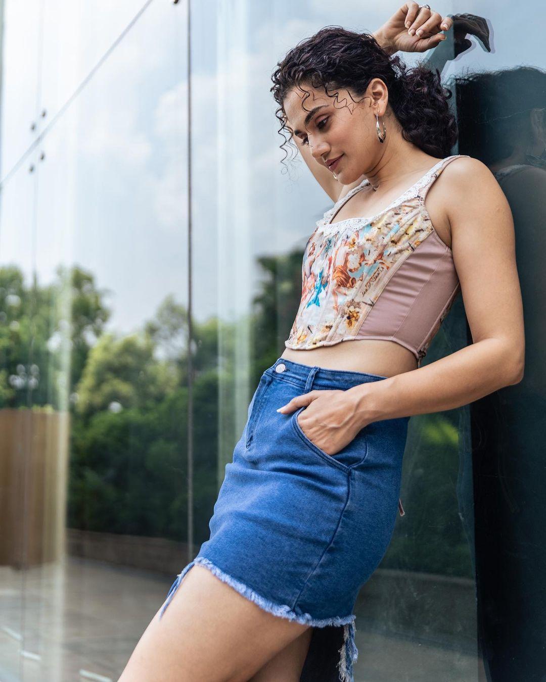 No one can ever go wrong with a denim skirt and a corset top. Taapsee excuses summer chic in this ensemble