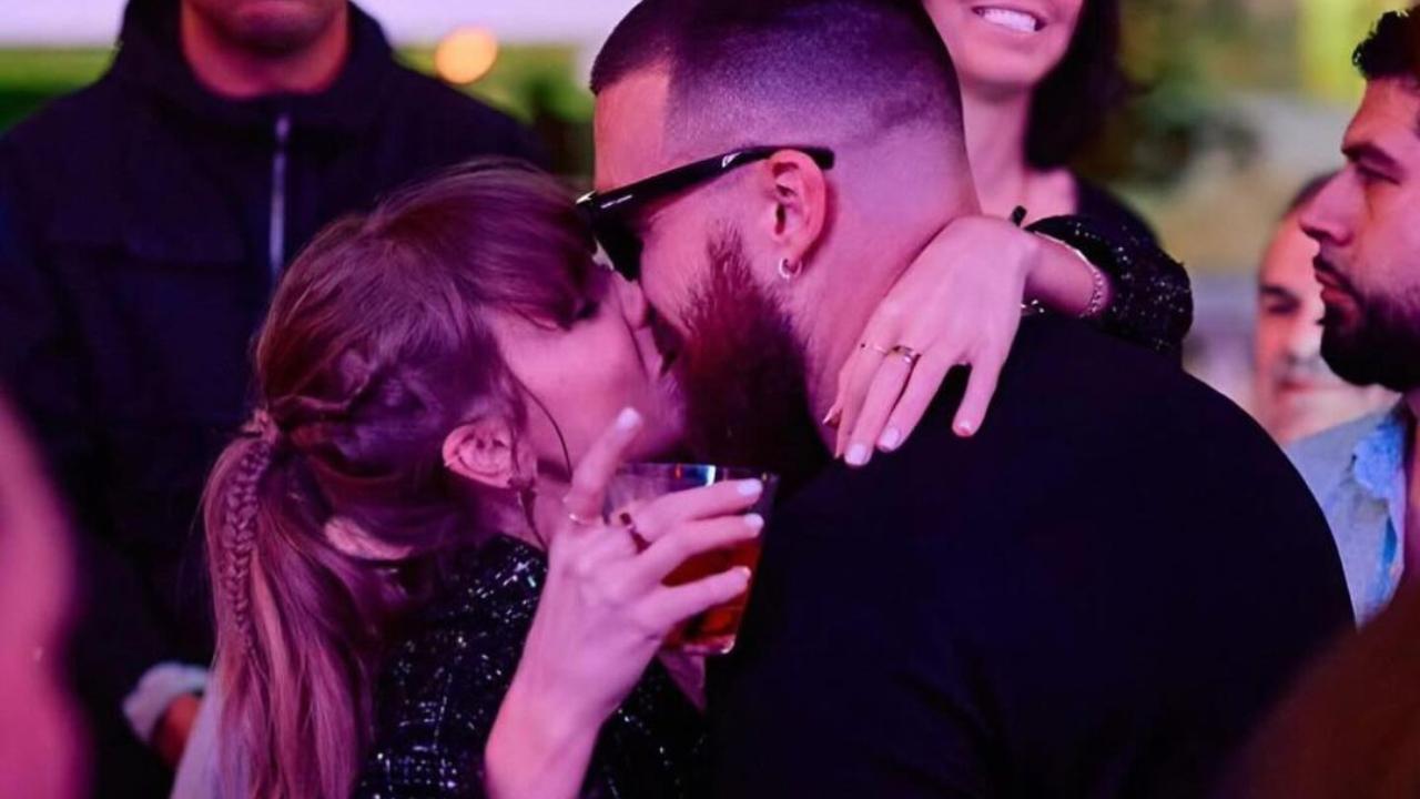 Taylor Swift, Travis Kelce share a kiss while singing 'Love Story'