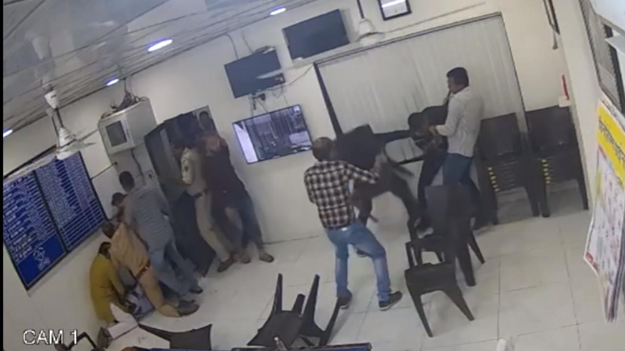 Eknath Shinde-led Shiv Sena leaders Mahesh Gaikwad and Rahul Patil being taken to a hospital after they were allegedly shot by BJP MLA Ganpat Gaikwad on Friday. Pics/PTI and CCTV grabs/Navneet Barate (Story/Faisal Tandel)