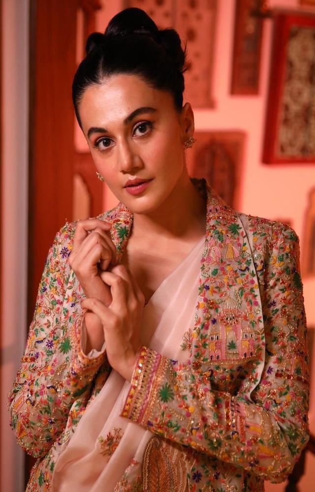An embroidered jacket works perfectly when layered with a saree to elevate a mundane look. 
