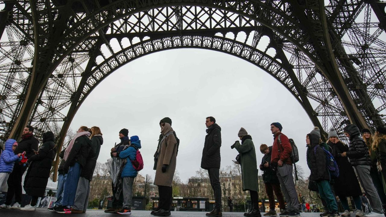 Huge queues of visitors were seen on the first day of re-opening on the historic Eiffel Tower