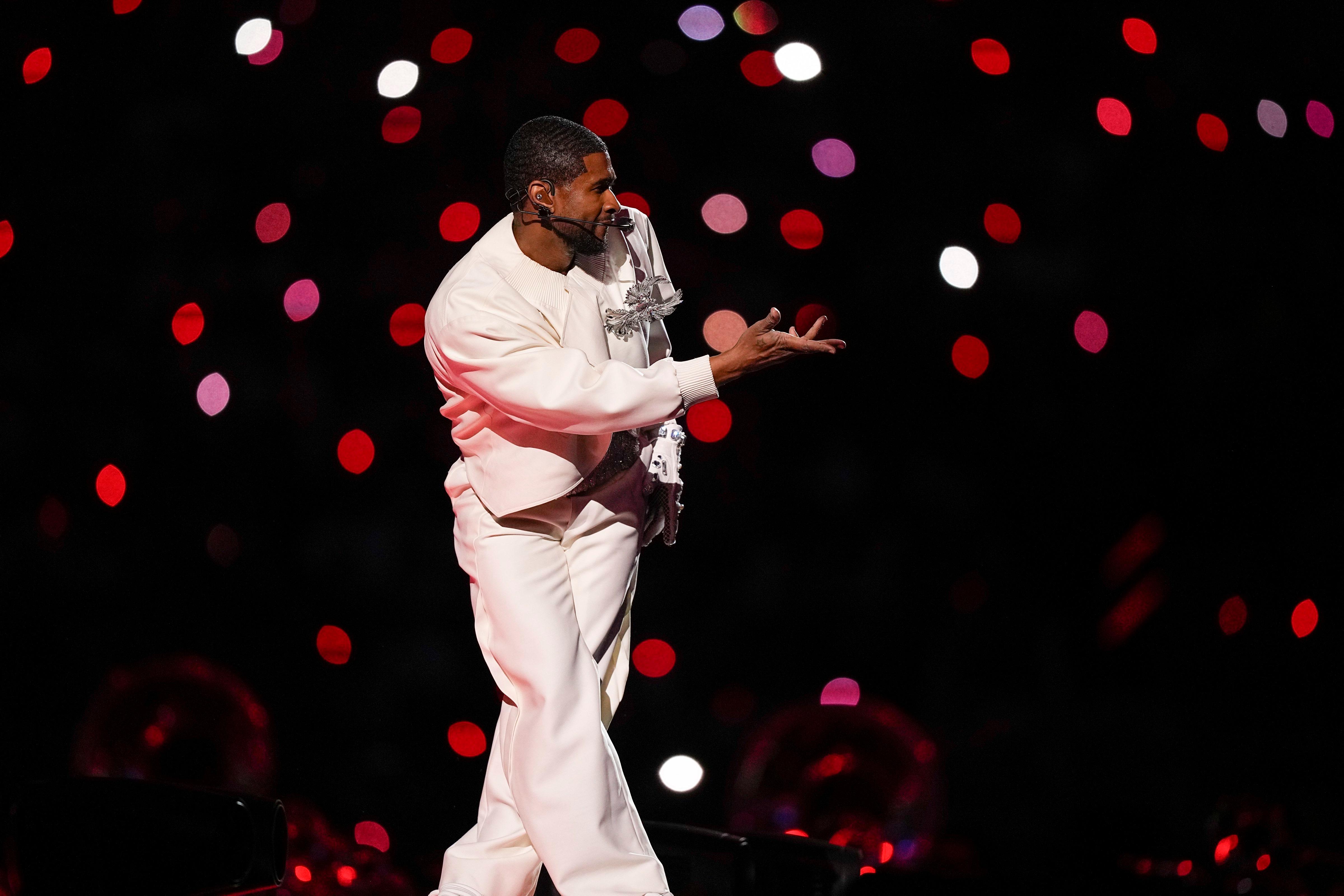 His show paid homage to Michael Jackson, who with his 1993 set transformed the halftime gig into one of music's most-watched -- and most-coveted. At one point Usher donned a single glove, a clear nod to the groundbreaking pop artist. 