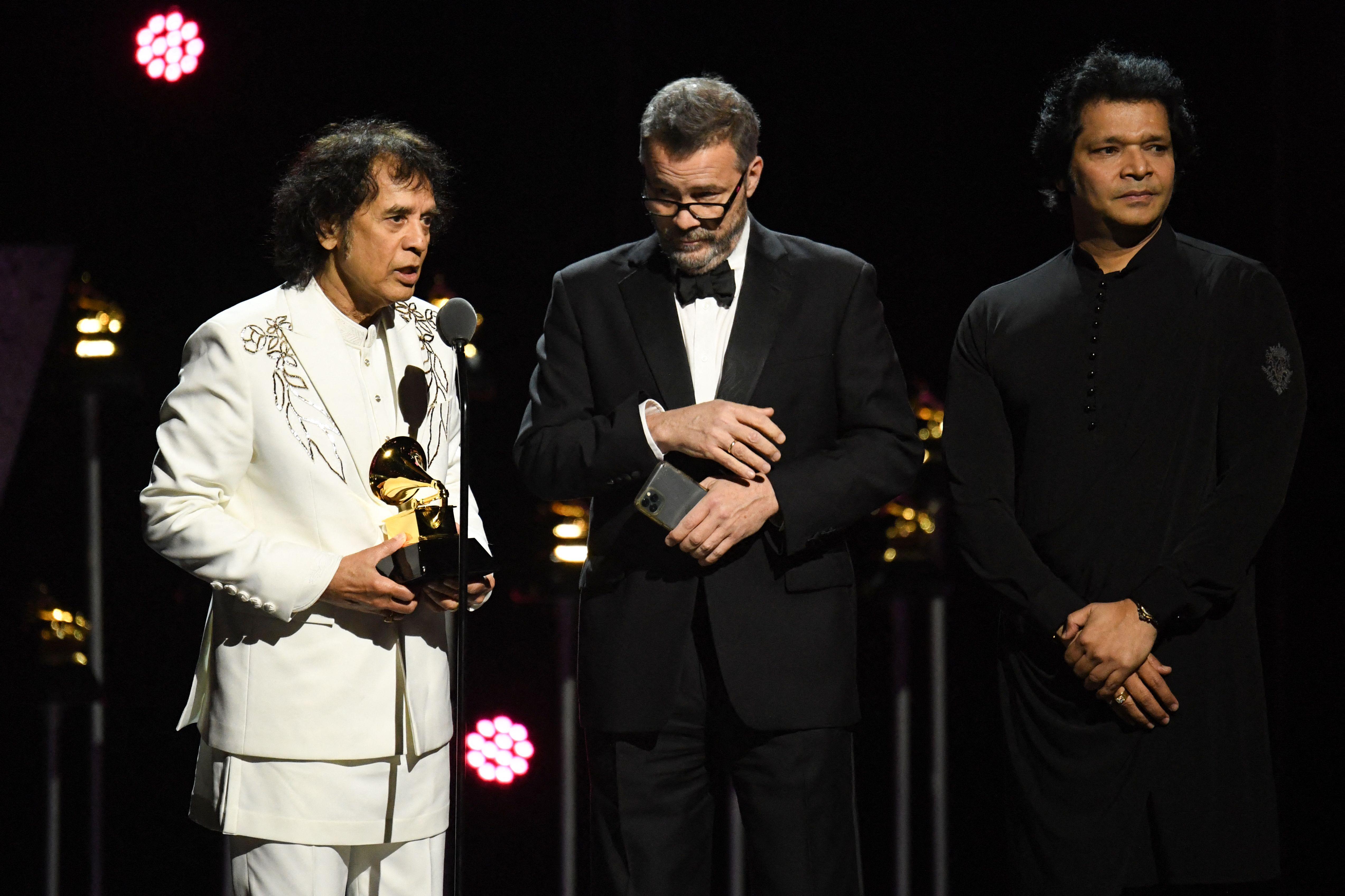 Tabla maestro Ustad Zakir Hussain's fusion group Shakti won the Grammy Award for best global music album for 'This Moment'. The album features four Indians - Hussain, Shankar Mahadevan, violinist Ganesh Rajagopalan and percussionist Selvaganesh Vinayakram - as well as its founding member, the legendary British guitarist John McLaughlin. (Photo: AFP)