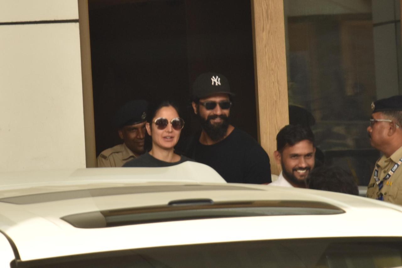 The two love birds smiled at the paparazzi as they returned to the city
