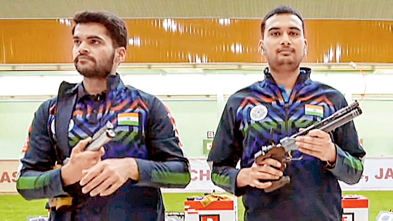 India pistol shooters Arjun Cheema (left) and Varun Tomar at the Senayan Shooting Range in Jakarta yesterday. Pics/PTI