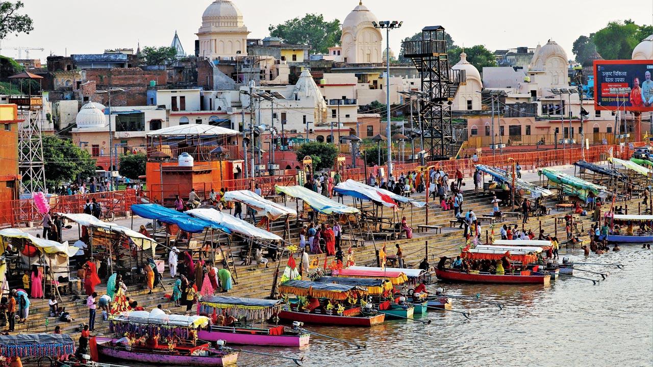 Devotees flock to take a dip in the Saryu river, which is considered to wash away one’s sins