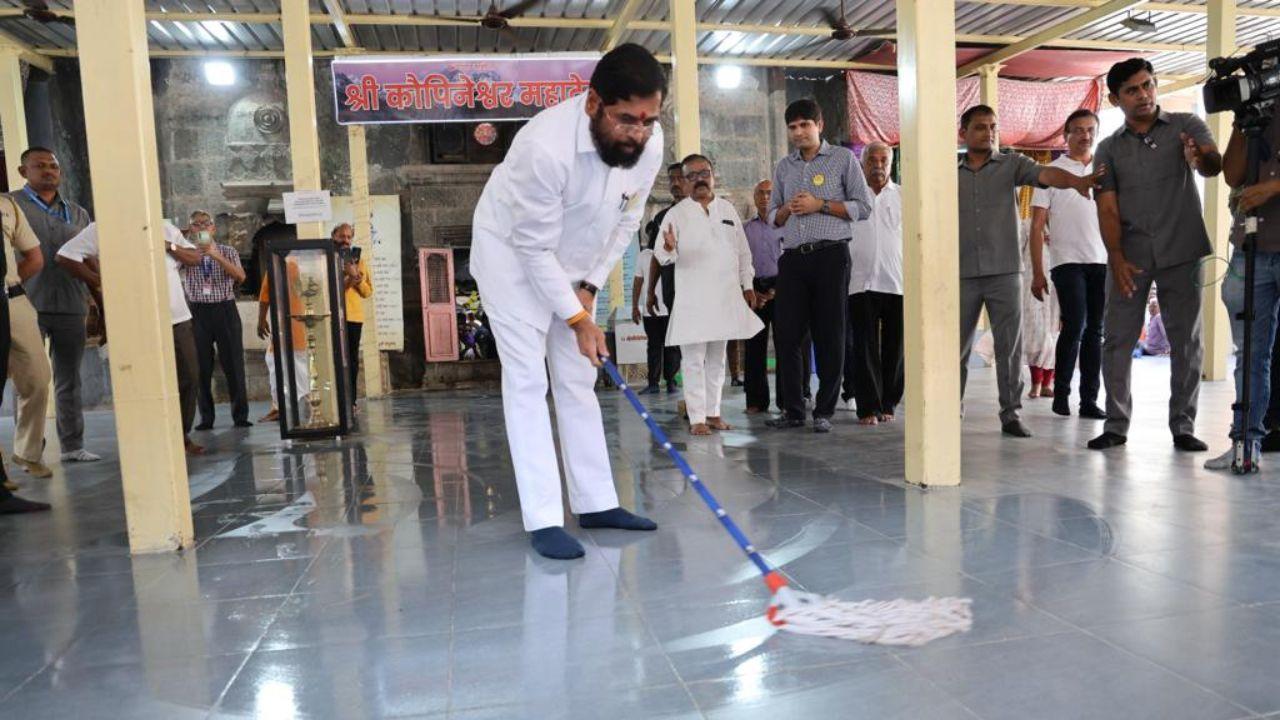IN PHOTOS: CM Shinde leads deep cleaning drive at Kopineshwar temple in Thane