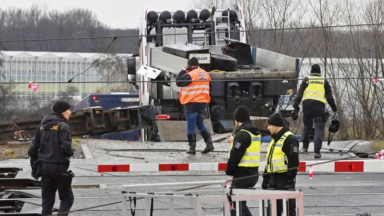 One dead, 19 hurt as train rams bus in Czechia